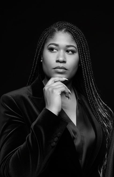 Portrait of Jay Louise in a black blazer